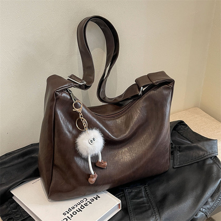 Damen Handtasche mit verspieltem Schlüsselanhänger Nord Taschen