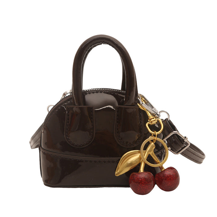 Damen Mini Umhängetasche mit fruchtigem Anhänger Nord Taschen