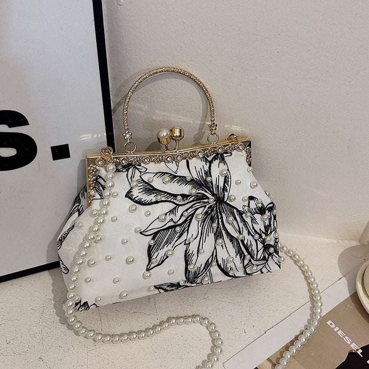 Damen Clutch-Tasche mit perlverziertem Blumenmuster und elegantem Metallverschluss Nord Taschen
