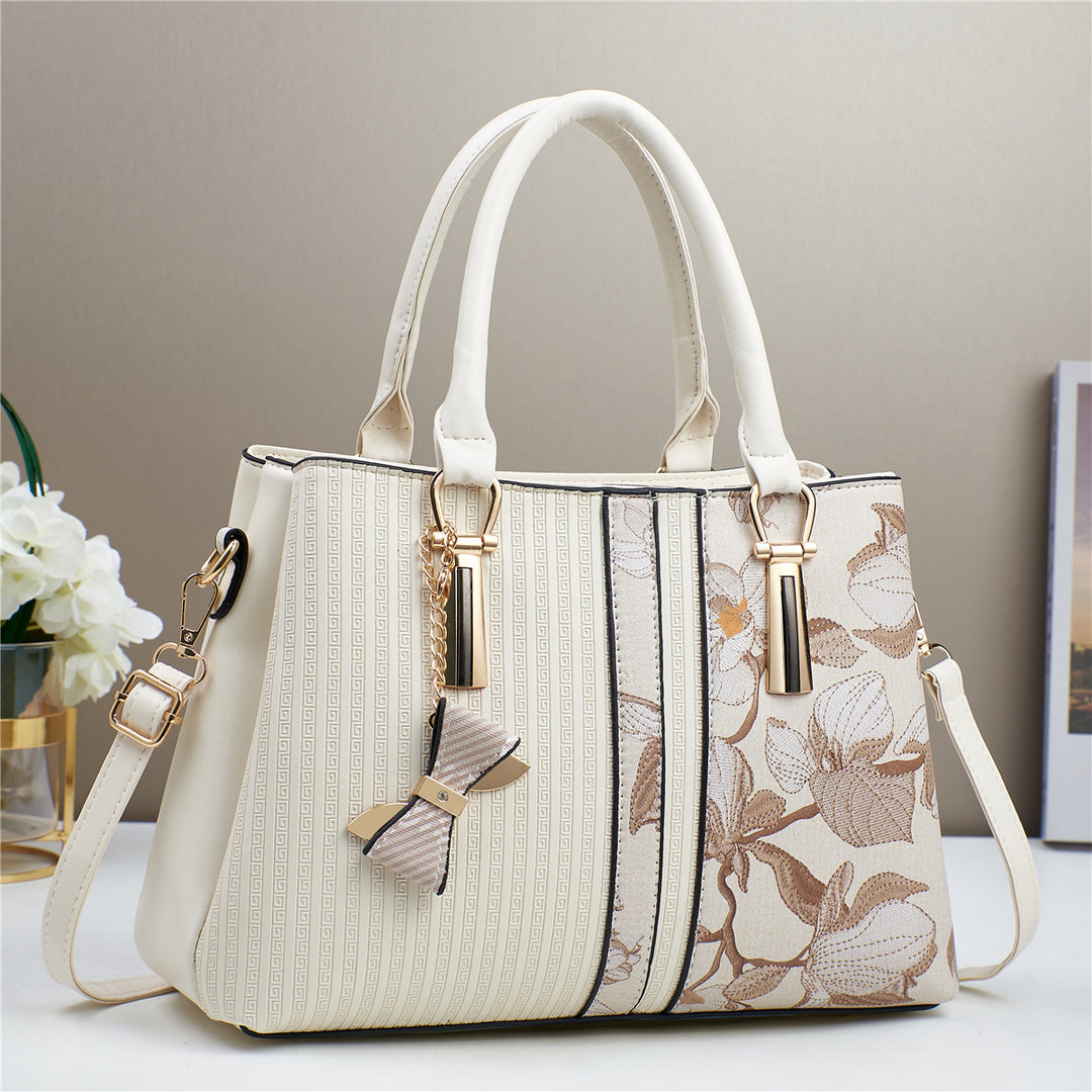Damen elegante Handtasche mit floralen Akzenten Nord Taschen