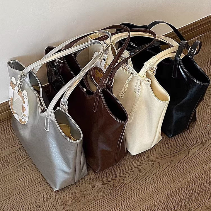 Damen Einkaufstasche mit eleganter geschwungener Form und hochwertiger Oberflächenstruktur Nord Taschen