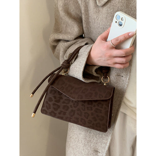 Damen Umhängetasche mit eleganter Leo-Prägung und abnehmbarem Schulterriemen Nord Taschen