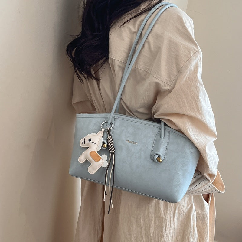 Damen modische Handtasche mit verspieltem Anhänger Nord Taschen
