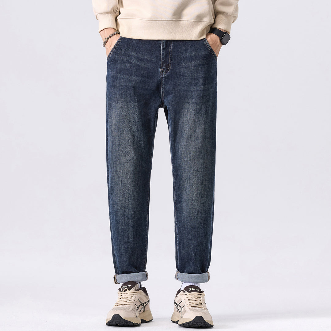 Herren Tapered-Denimhose mit mittelhohem Bund, gekrempeltem Saum und dezenter Used-Waschung Nord Taschen