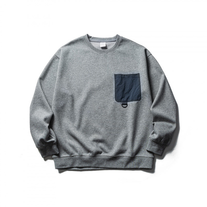 Unisex Oversize-Sweatshirt mit aufgesetzter Brusttasche und D-Ring Nord Taschen