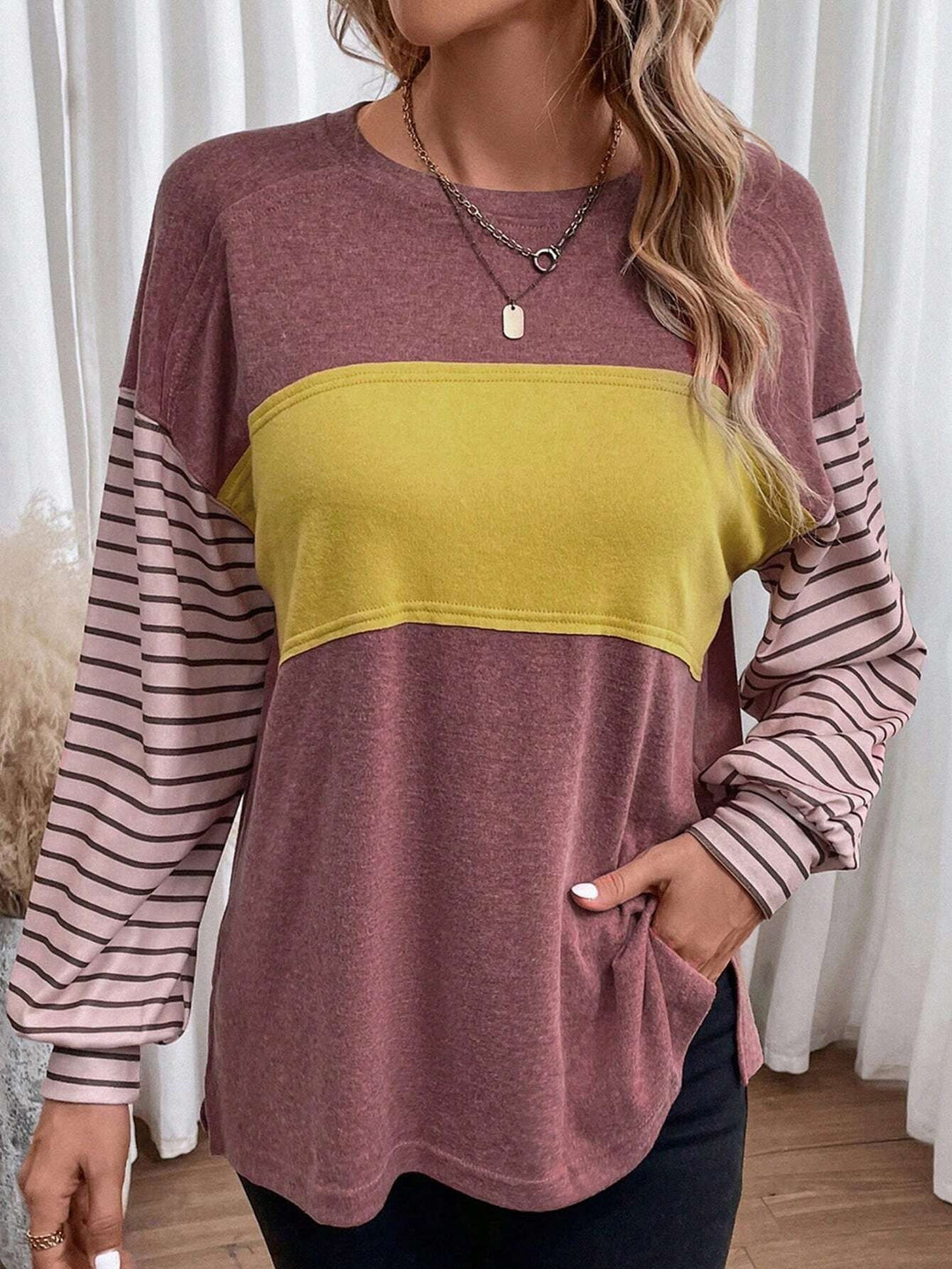 Damen Lockeres Colorblock-Sweatshirt mit gestreiften Ärmeln und Rundhalsausschnitt Nord Taschen