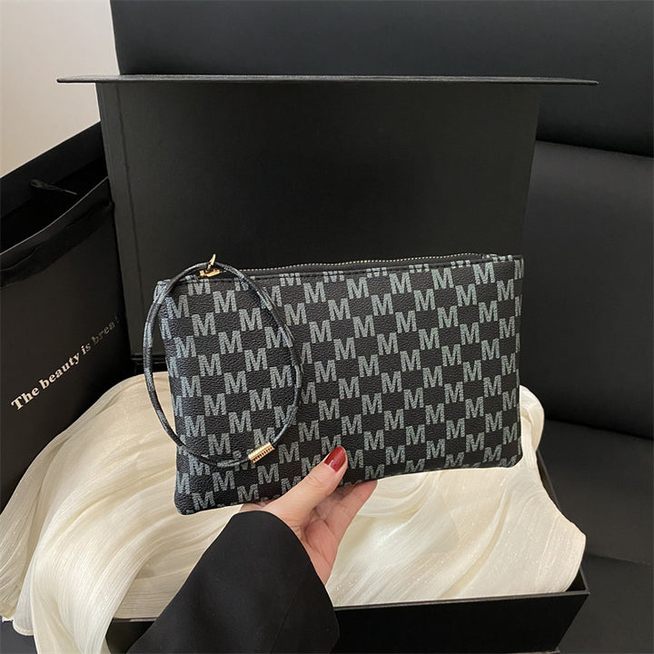 Damen Clutch mit elegantem Ringgriff Nord Taschen