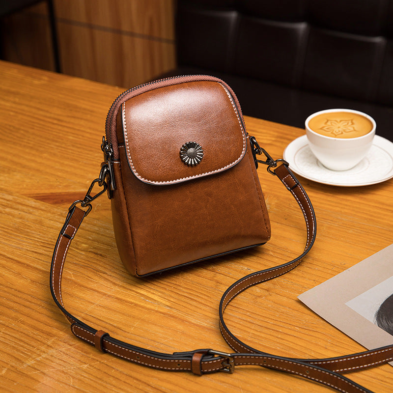 Damen Umhängetasche aus hochwertigem Kunstleder mit praktischem Faltendesign Nord Taschen