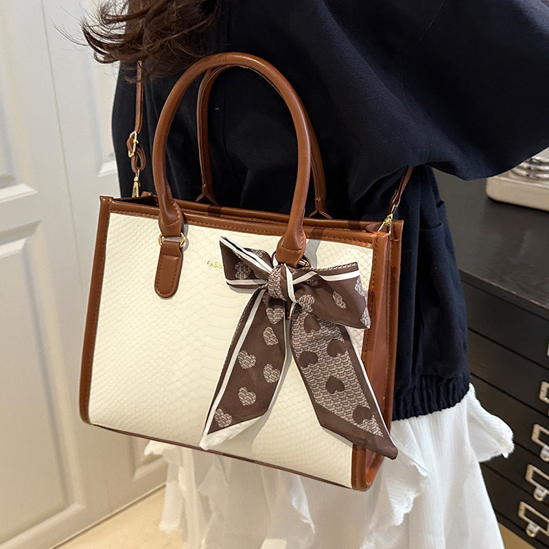 Damen stilvolle Handtasche mit geflochtenem Design und dekorativem Schleifenband Nord Taschen
