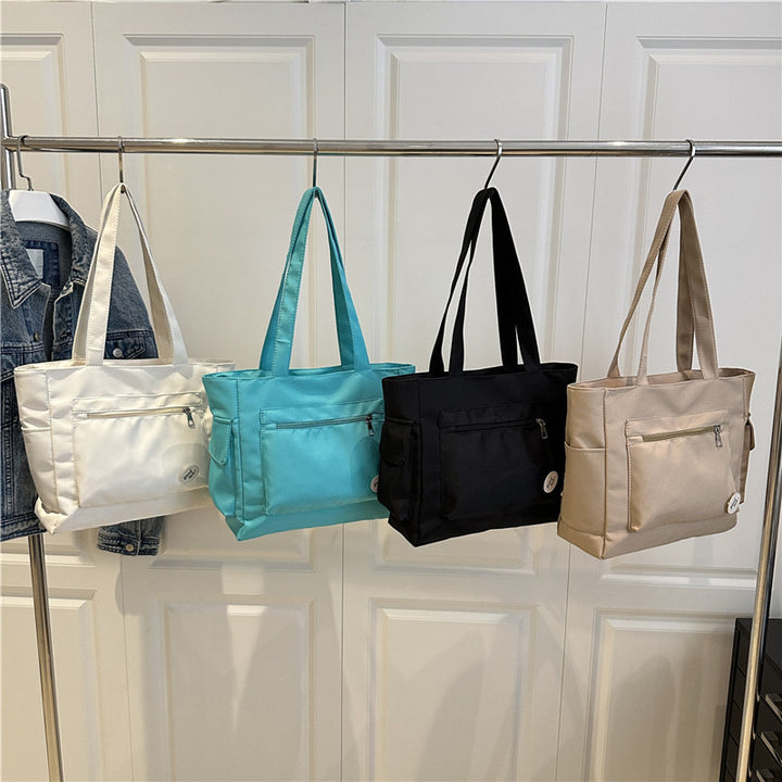 Damen Designer Handtasche mit modernem Klappverschluss Nord Taschen