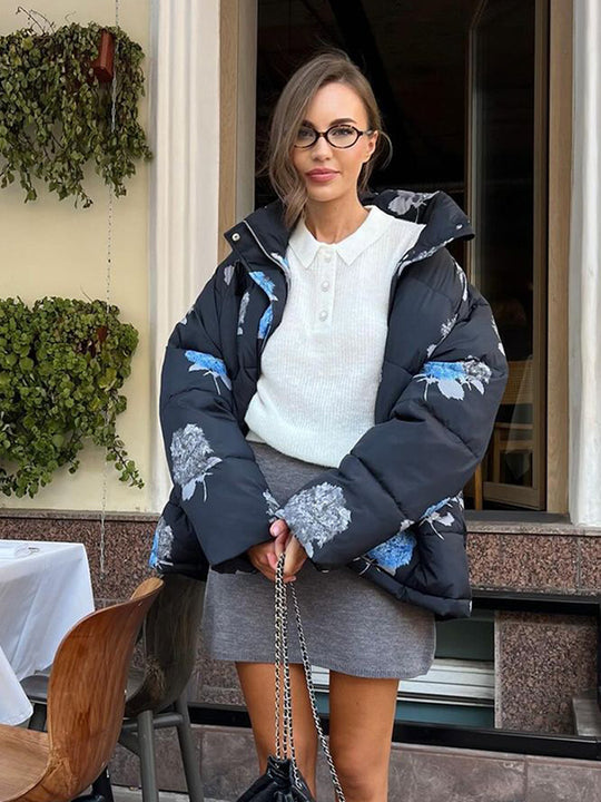 Damen Gepolsterte Oversize-Steppjacke mit Blumenprint und Kapuze Nord Taschen