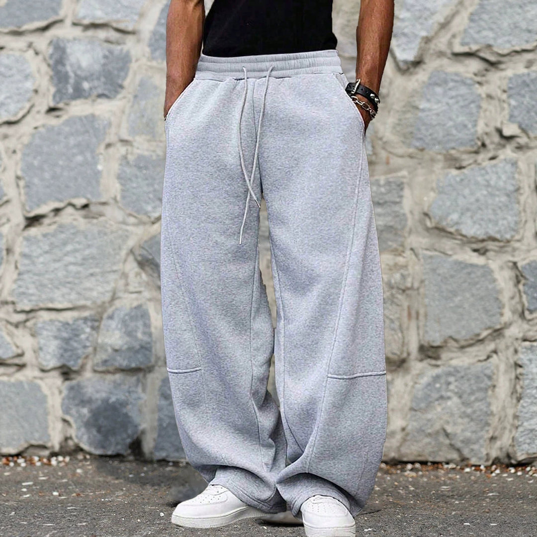 Herren weite Sweatpants im Baggy Cut mit elastischem Bund, Tunnelzug und Eingrifftaschen Nord Taschen