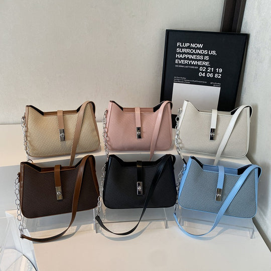 Damen stylische Umhängetasche mit geprägtem Design und dekorativer Kettenverzierung Nord Taschen