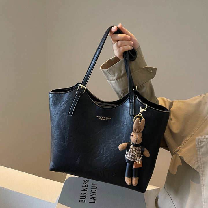 Damen große Handtasche mit verspieltem Stoffanhänger Nord Taschen