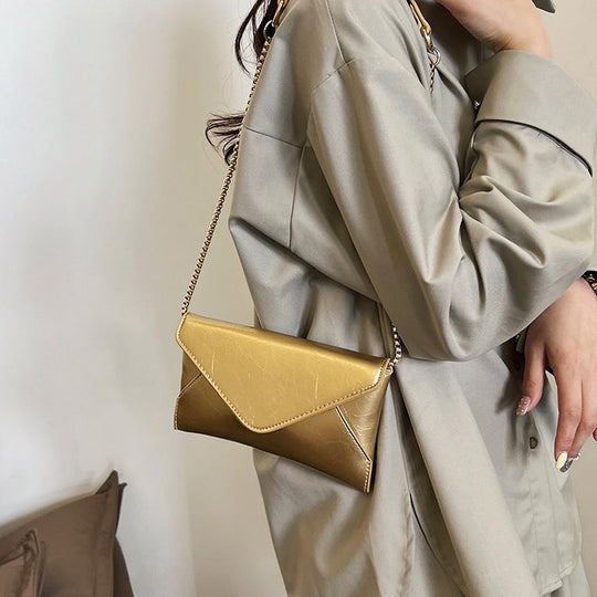 Damen Umhängetasche aus hochwertigem Kunstleder mit elegantem Kettenriemen Nord Taschen