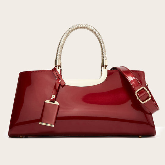 Damen elegante Handtasche mit glänzender Oberfläche und geflochtenen Tragegriffen Nord Taschen