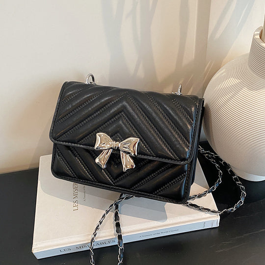Damen Designer-Handtasche mit strukturiertem Karomuster und stilvollem Kettenverschluss Nord Taschen