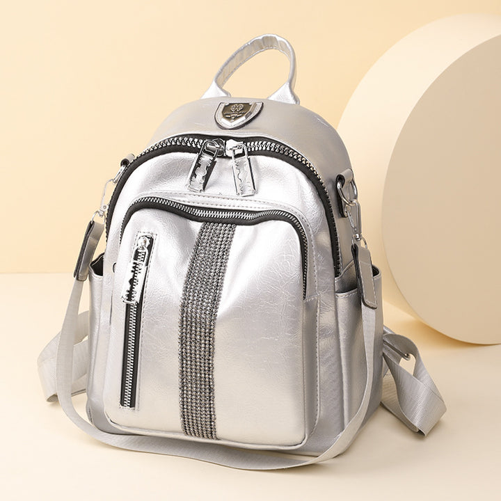 Damen Mini-Rucksack mit stylischen Reißverschlusstaschen und dekorativem Anhänger Nord Taschen