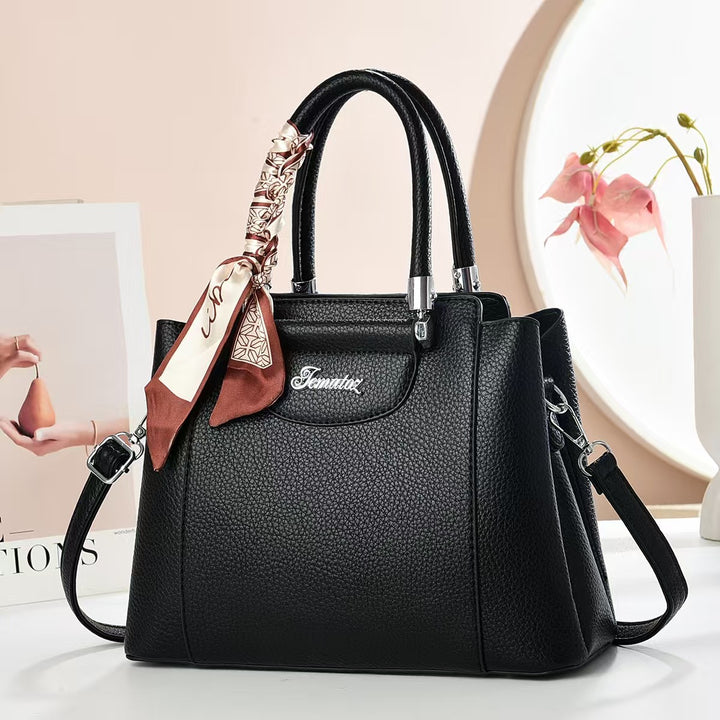 Damen Handtasche mit strukturiertem Kunstleder und stilvollem Schal Nord Taschen