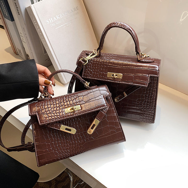 Damen Handtasche im luxuriösen Krokodil-Look mit goldenen Details | Nord Taschen