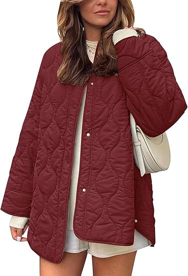 Damen Steppjacke im Oversize Design mit gewölbter Steppung und seitlichem Schlitz Nord Taschen