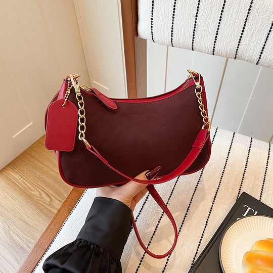 Damen elegante Umhängetasche mit feinem Kettenakzent Nord Taschen