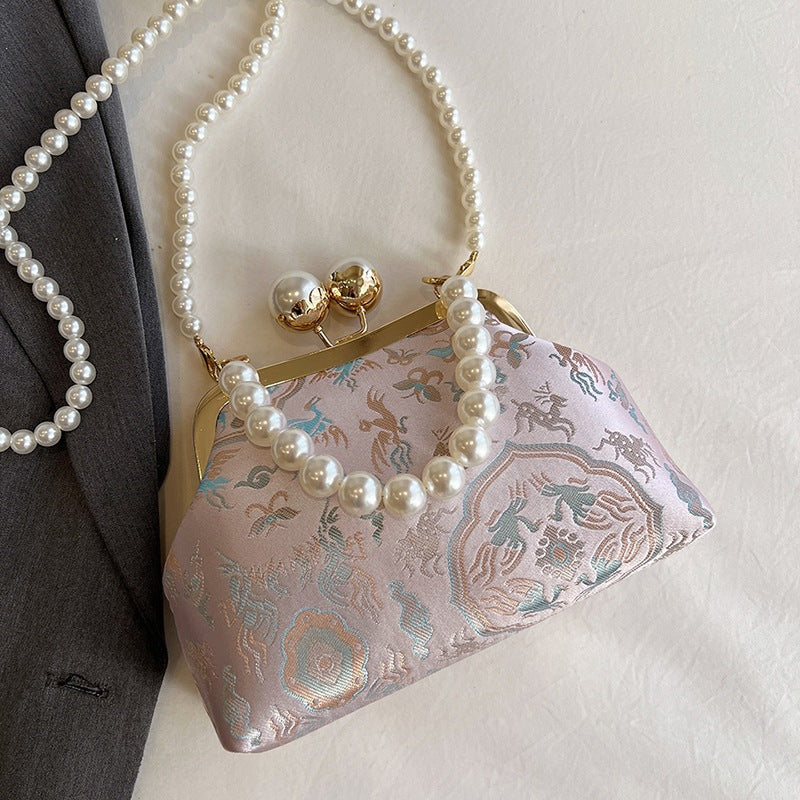 Damen elegante Clutch mit perlverziertem Rahmen Nord Taschen
