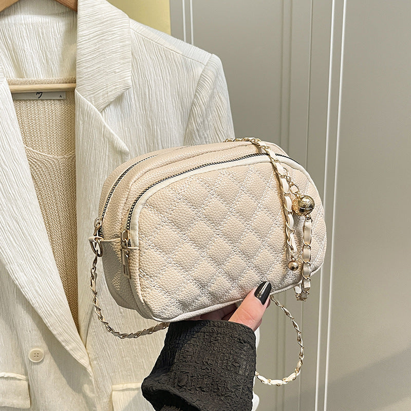 Damen elegante Umhängetasche mit gesteppter Struktur und modischen Kettenakzenten Nord Taschen