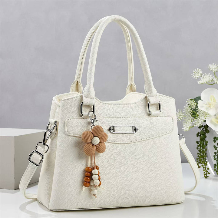 Damen elegante Handtasche mit abnehmbarem Blumen-Anhänger Nord Taschen