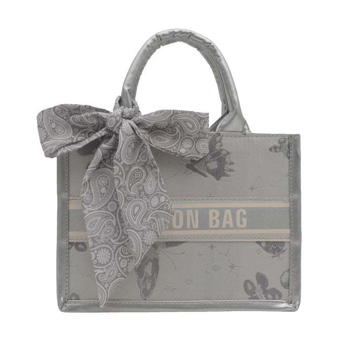 Damen Handtasche im eleganten Design mit dekorativem Schal Nord Taschen