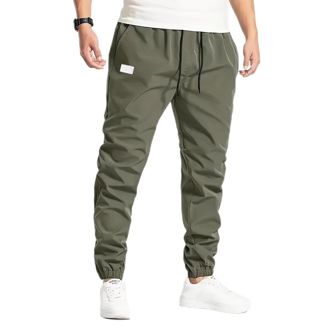Herren Technische Jogginghose im Tapered‑Utility‑Stil mit elastischem Bund & Knöchelbündchen Nord Taschen