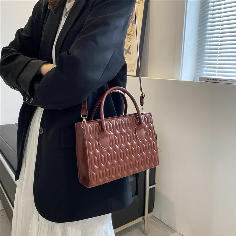 Damen elegante Handtasche mit quilted Design Nord Taschen