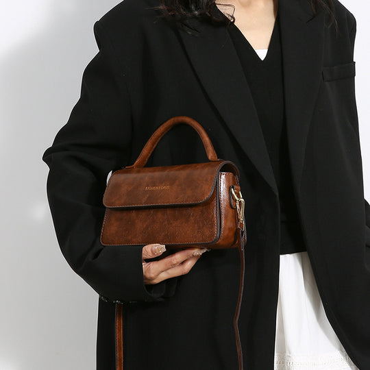Damen elegante Umhängetasche mit abnehmbaren Schulterriemen und strukturiertem Design Nord Taschen
