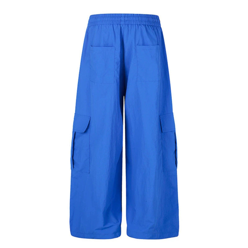 Damen Weite Palazzo-Cargohose mit elastischem Tunnelzugbund, großen Klappentaschen und Statement-Schriftprint Nord Taschen