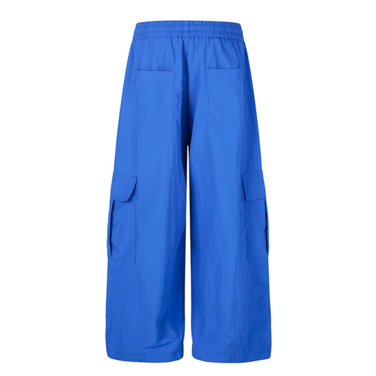 Damen Weite Palazzo-Cargohose mit elastischem Tunnelzugbund, großen Klappentaschen und Statement-Schriftprint Nord Taschen