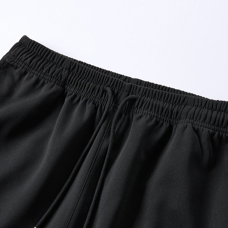 Herren weite Baggy-Trainingshose mit Tunnelzugbund, elastischem Komfortbund und seitlichem Streifendetail Nord Taschen