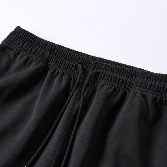 Herren weite Baggy-Trainingshose mit Tunnelzugbund, elastischem Komfortbund und seitlichem Streifendetail Nord Taschen