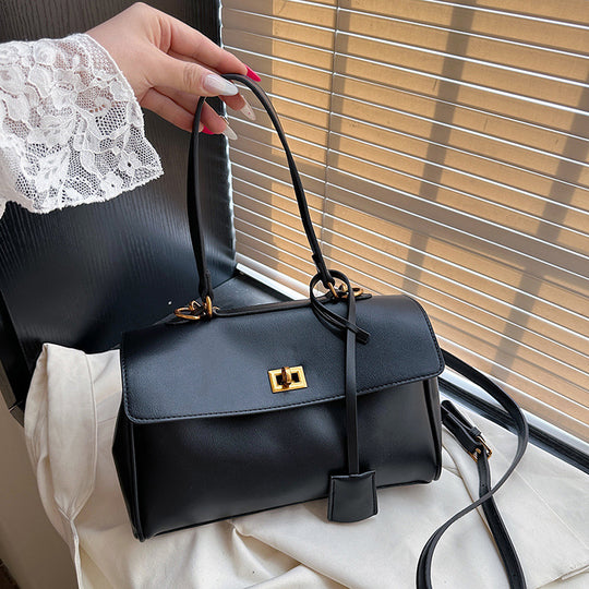 Damen modische Handtasche mit eleganter Struktur und goldenen Verzierungen | Nord Taschen
