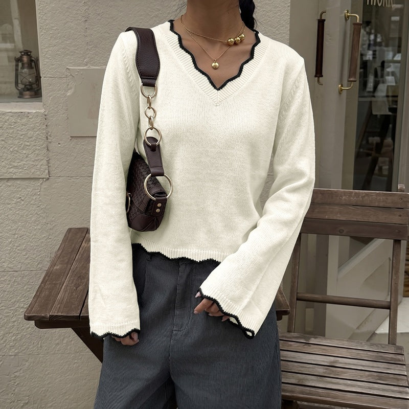 Damen Feinstrick-V‑Pullover mit gewelltem Saum, ausgestellten Ärmeln und Zierpaspel Nord Taschen