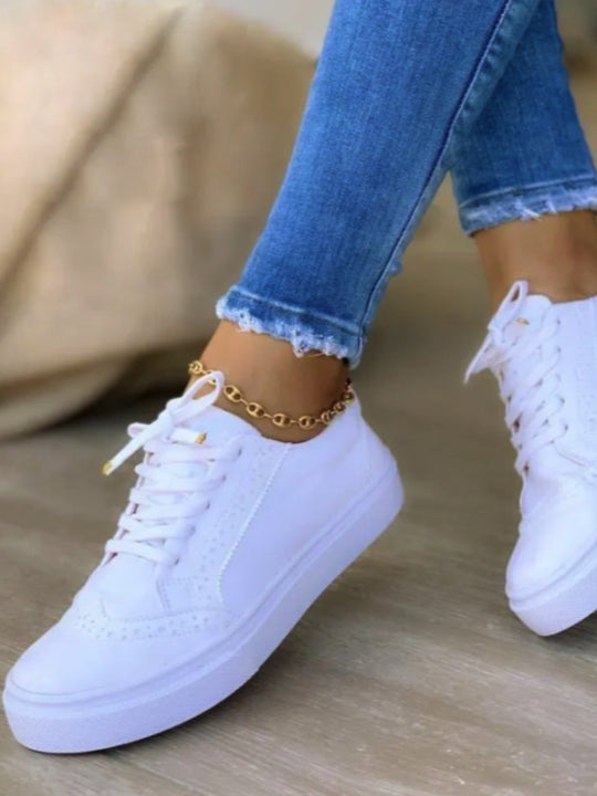 Damen Sneaker im eleganten Vintage-Look mit modischen Broguemustern