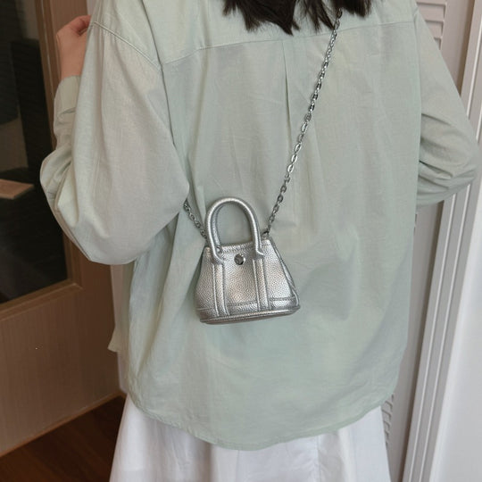 Damen Mini-Handtasche mit geschmeidiger Struktur und abnehmbarem Kettenriemen Nord Taschen