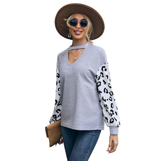 Damen Lässiger Pullover mit Leopardenärmel Nord Taschen
