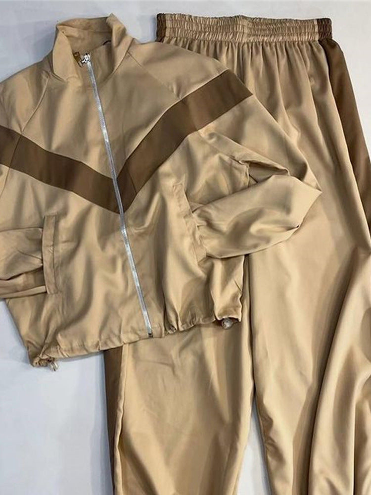 Damen Retro-Trainingsanzug mit Reißverschlussjacke und elastischer Bundhose Nord Taschen