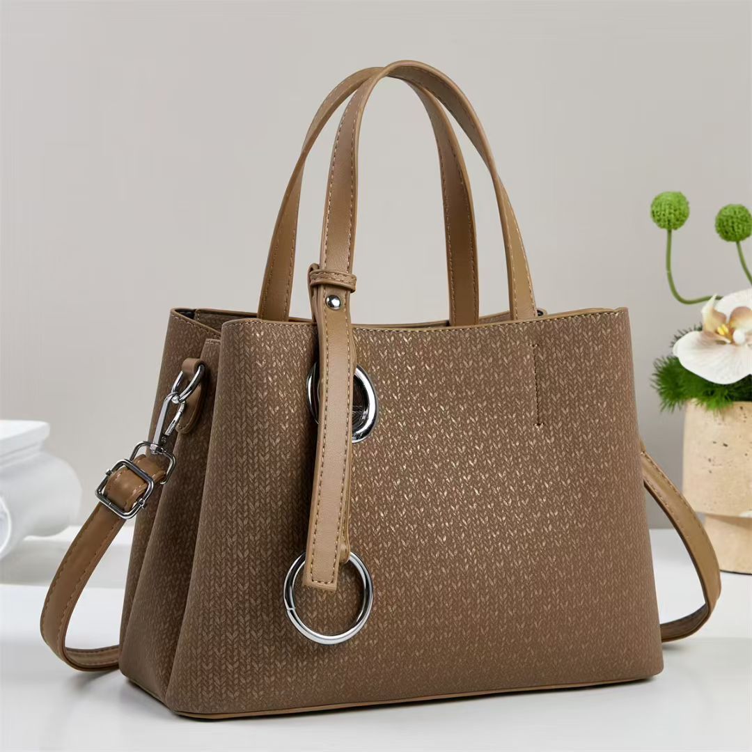 Damen Handtasche mit strukturiertem Design und eleganten Ringdetails Nord Taschen