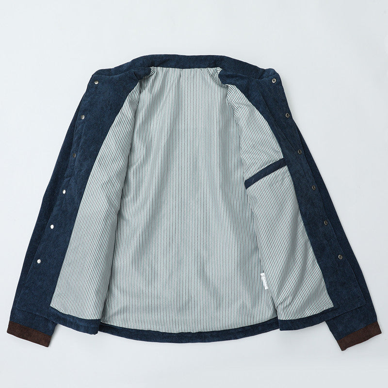 Herren Steppjacke im Cord-Mix mit Kontrast-Schulterpartie und verdeckter Druckknopfleiste Nord Taschen