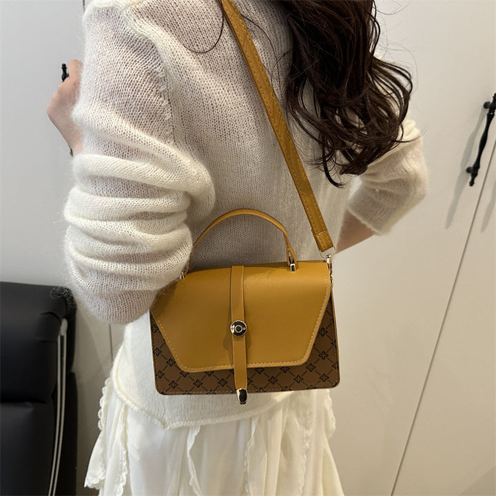 Damen Umhängetasche mit modernem Klappenverschluss und praktischem Handgriff Nord Taschen