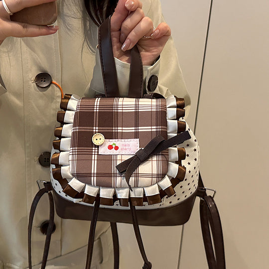 Damen Rucksack mit kreativem Karomuster und verspielten Details Nord Taschen