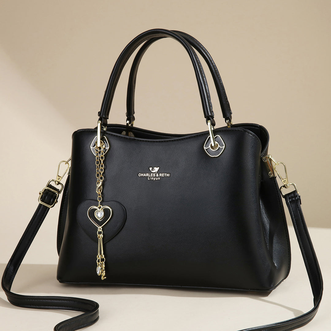 Damen elegante Handtasche mit Herzanhänger Nord Taschen