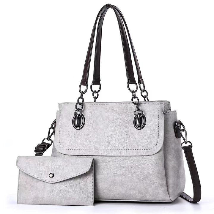 Damen Umhängetasche mit abnehmbarer Clutch und hochwertiger Lederoptik Nord Taschen