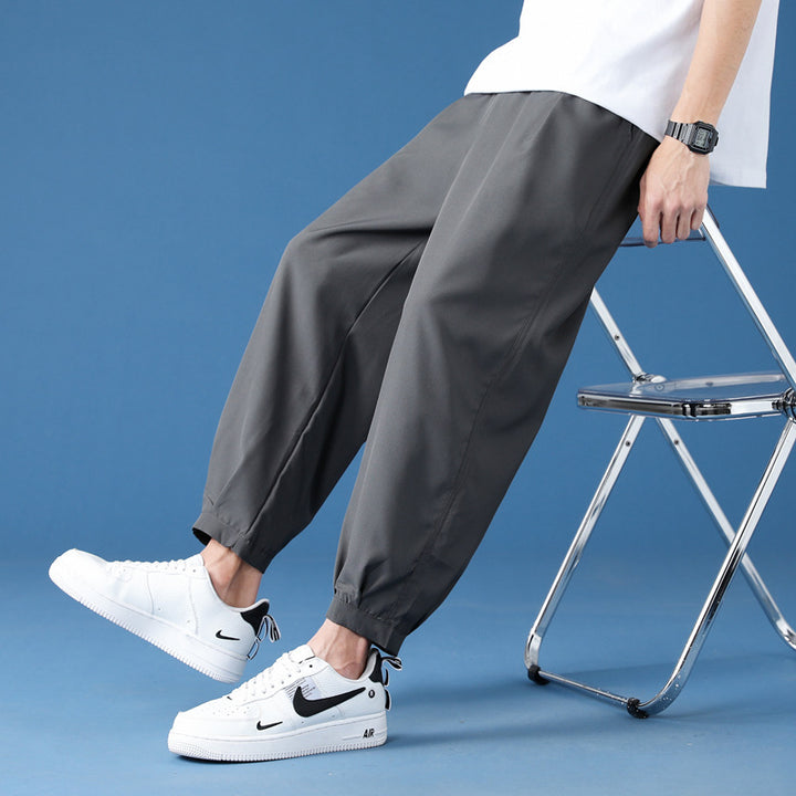 Herren weite technische Jogginghose mit elastischem Bund, gekräuseltem Beinabschluss und atmungsaktivem Stretchmaterial Nord Taschen